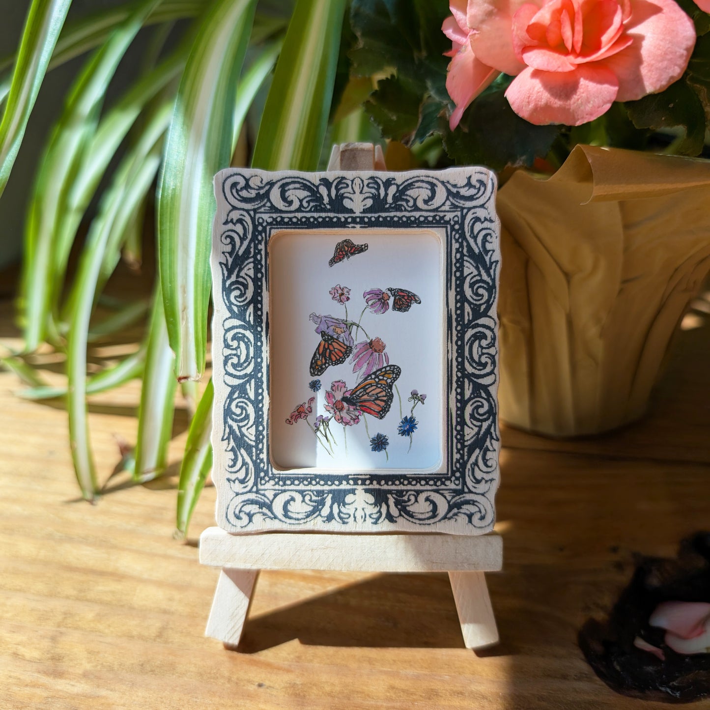 a picture frame with a picture of a butterfly on it