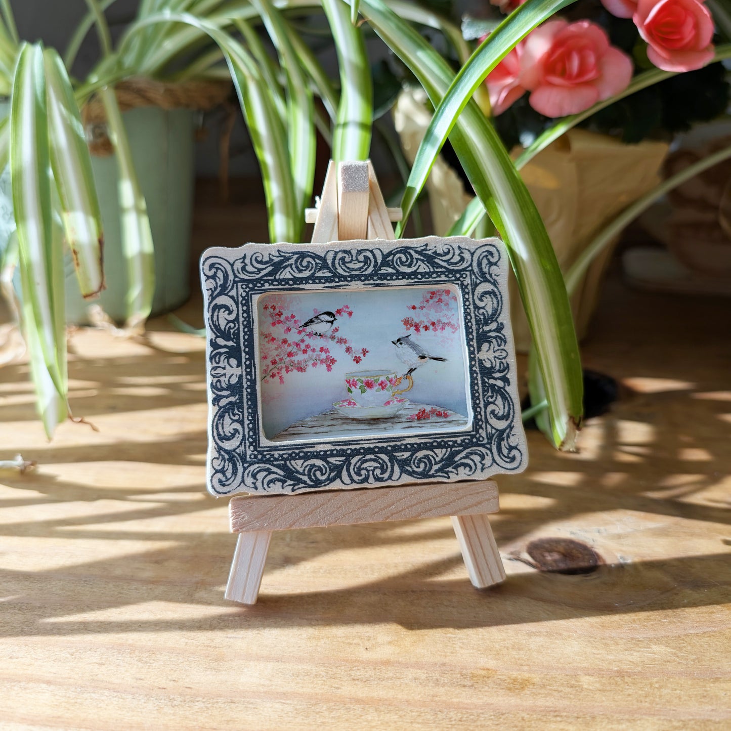a picture frame with a picture of a bird on it