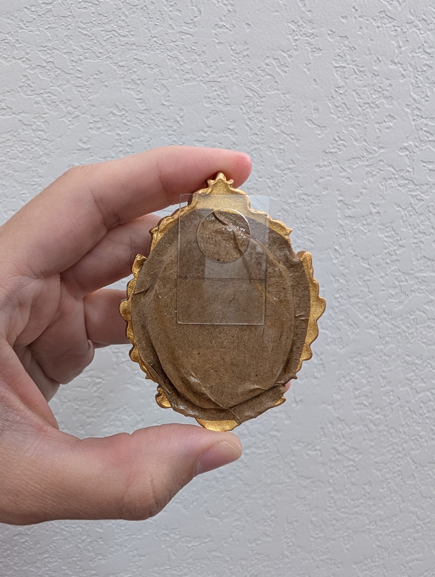 a person holding a piece of paper in their hand