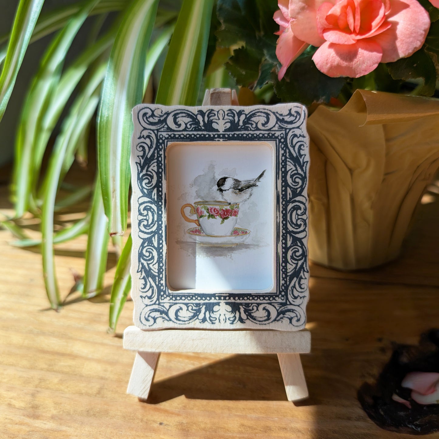a picture frame with a picture of a bird on it