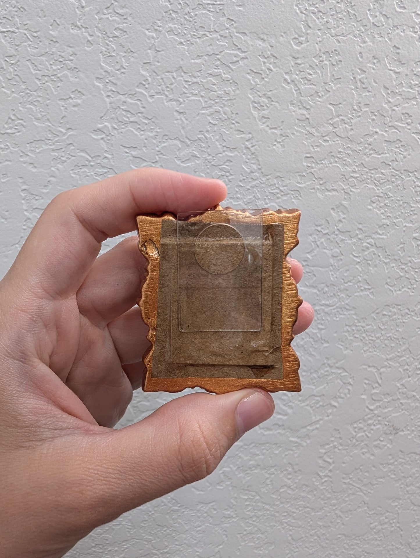 a person holding a piece of paper with a heart on it