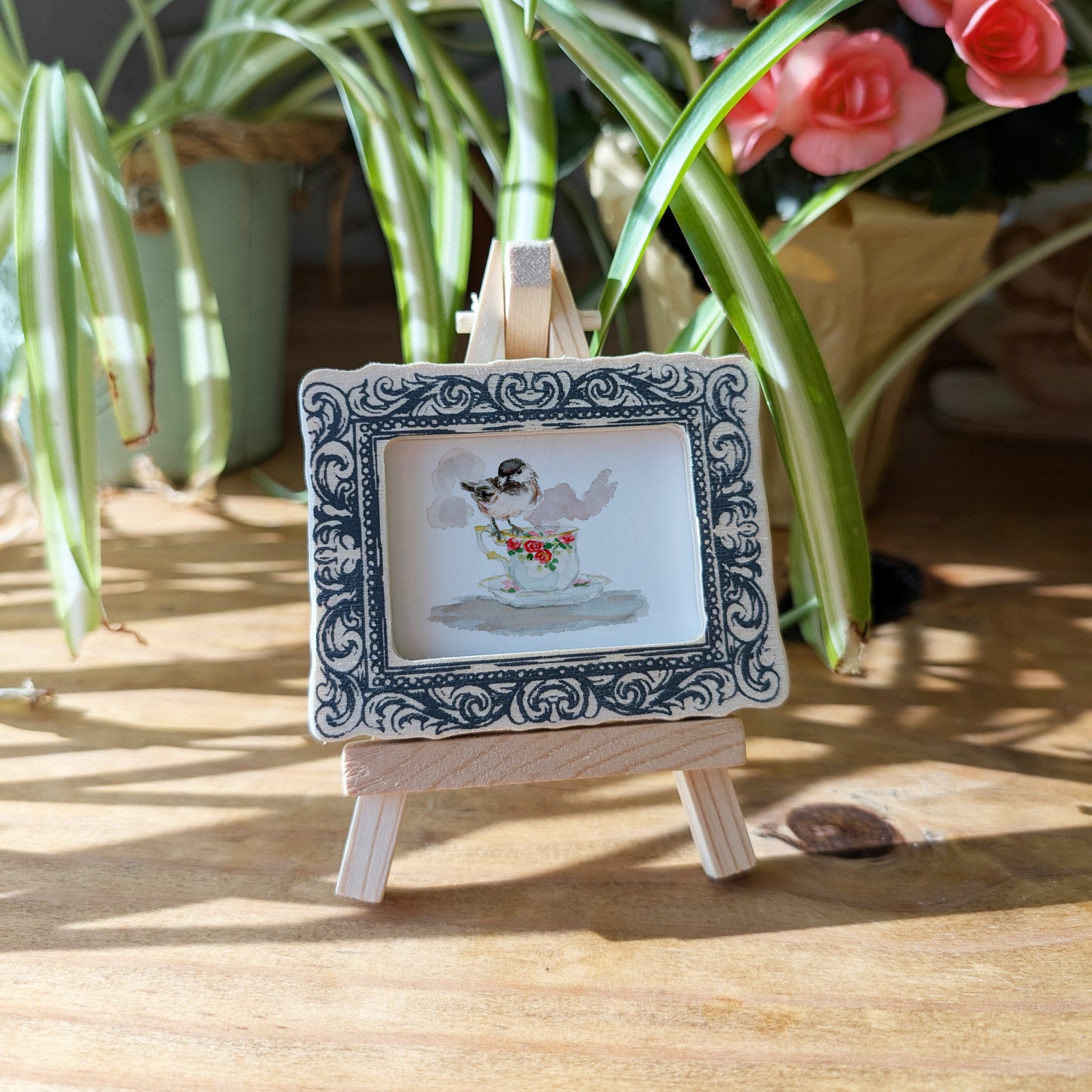 a picture frame with a picture of a bird on it