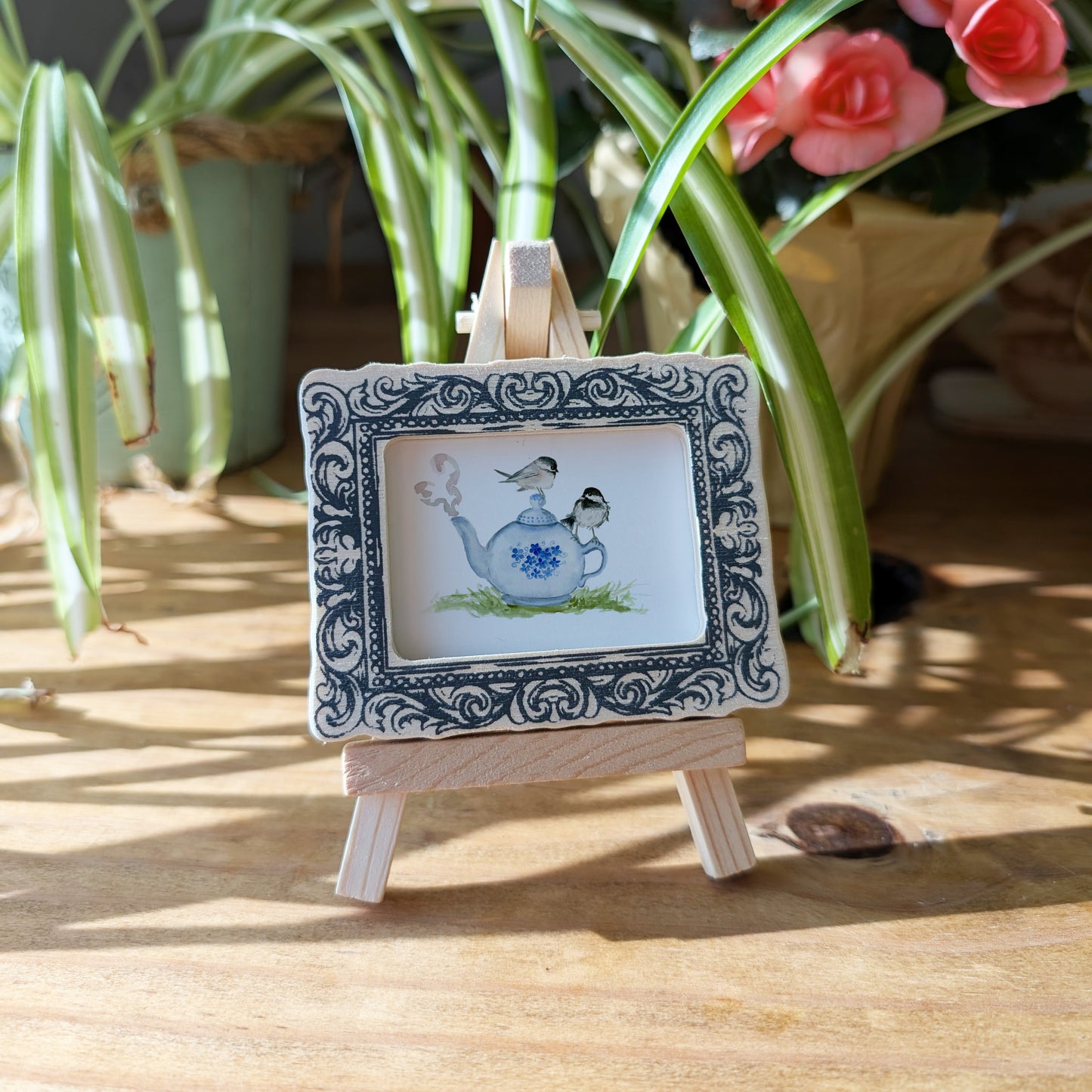 a picture frame with a picture of a bird on it