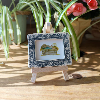 a picture frame with a picture of a couch on it