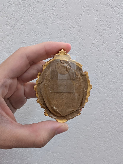 a person holding a piece of paper in their hand