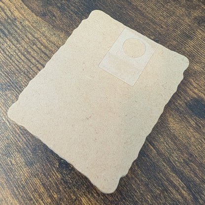 a piece of paper sitting on top of a wooden table