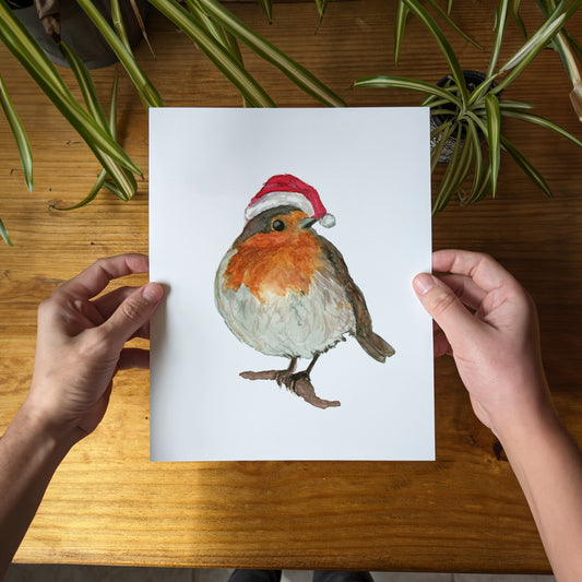 a person holding a card with a bird on it