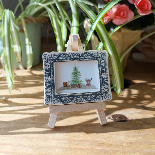 a picture frame with a picture of a christmas tree