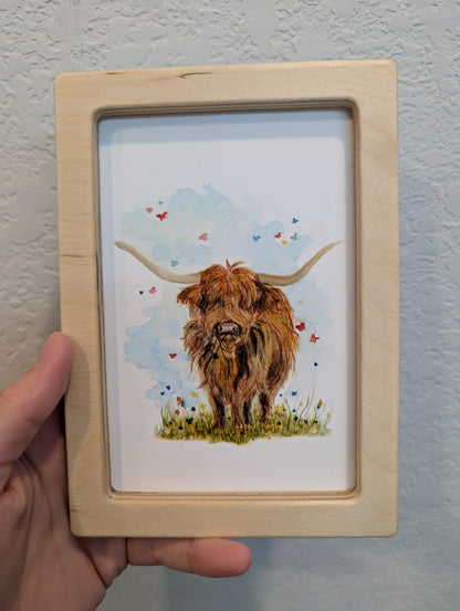Highland Cow in Field with Butterflies Art Print - Solidframe Art by Lora Cavallin
