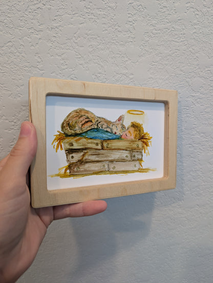 Infant Jesus in Manger with Cat Print - Solidframe Art by Lora Cavallin